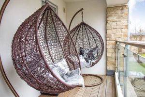 Swing seating on balcony of Howells Mere 47