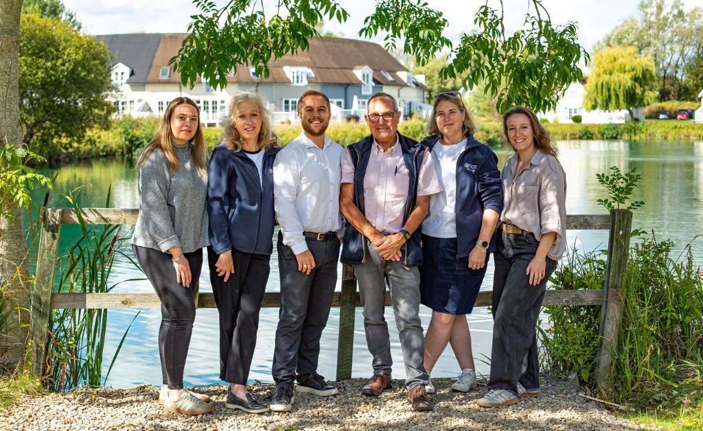 orion team by lake in cotswolds