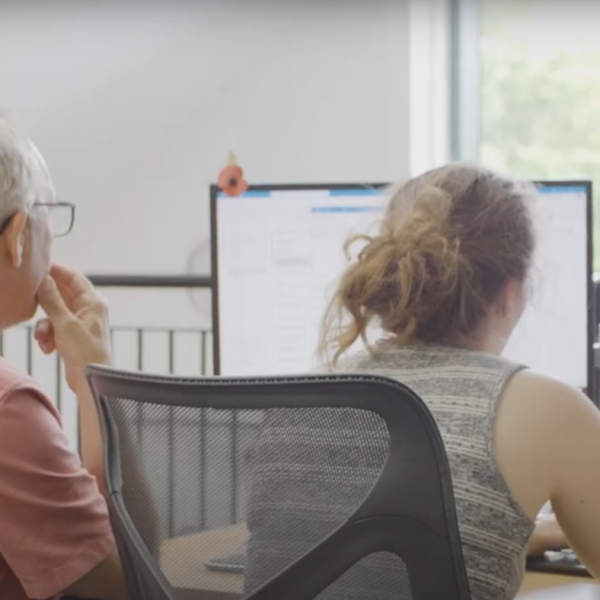 Mark and Natalie working in the office